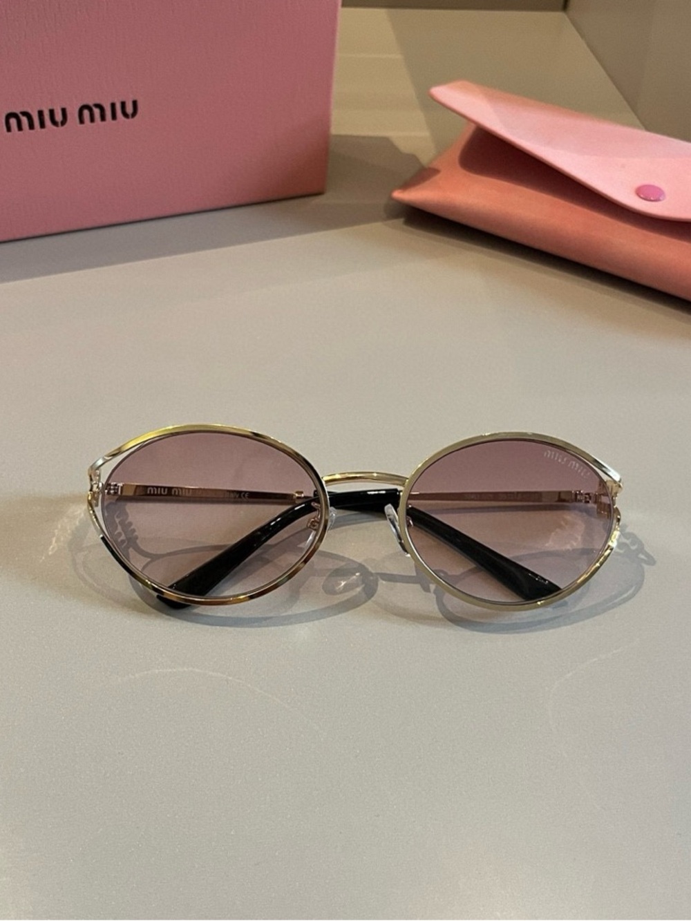 Miu Miu Gold Frame Sunglasses with Pink Gradient Lenses